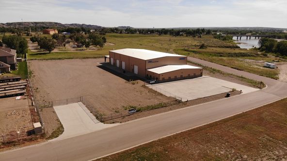 Functional +/-18,000+ SQ FT Shop on 3.11 Acres in Glendive, MT: 123 W Oregon Ln, Glendive, MT 59330